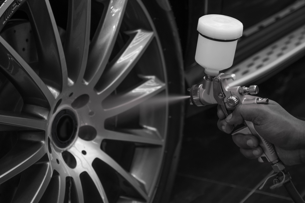 Black and White Photo of Ceramic Alloy Coating Process, Highlighting Precision Techniques in Automotive Finishing